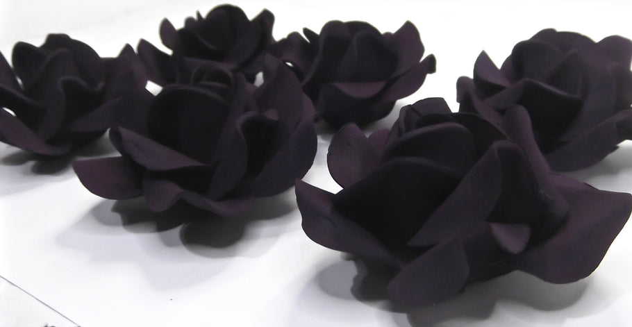 Dark Aubergine Roses prove popular!